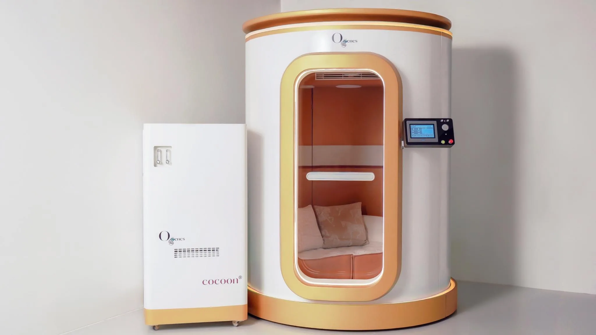 O2genes Elixir Hard Shell HBOT cocoon® beside its oxygen supply unit
