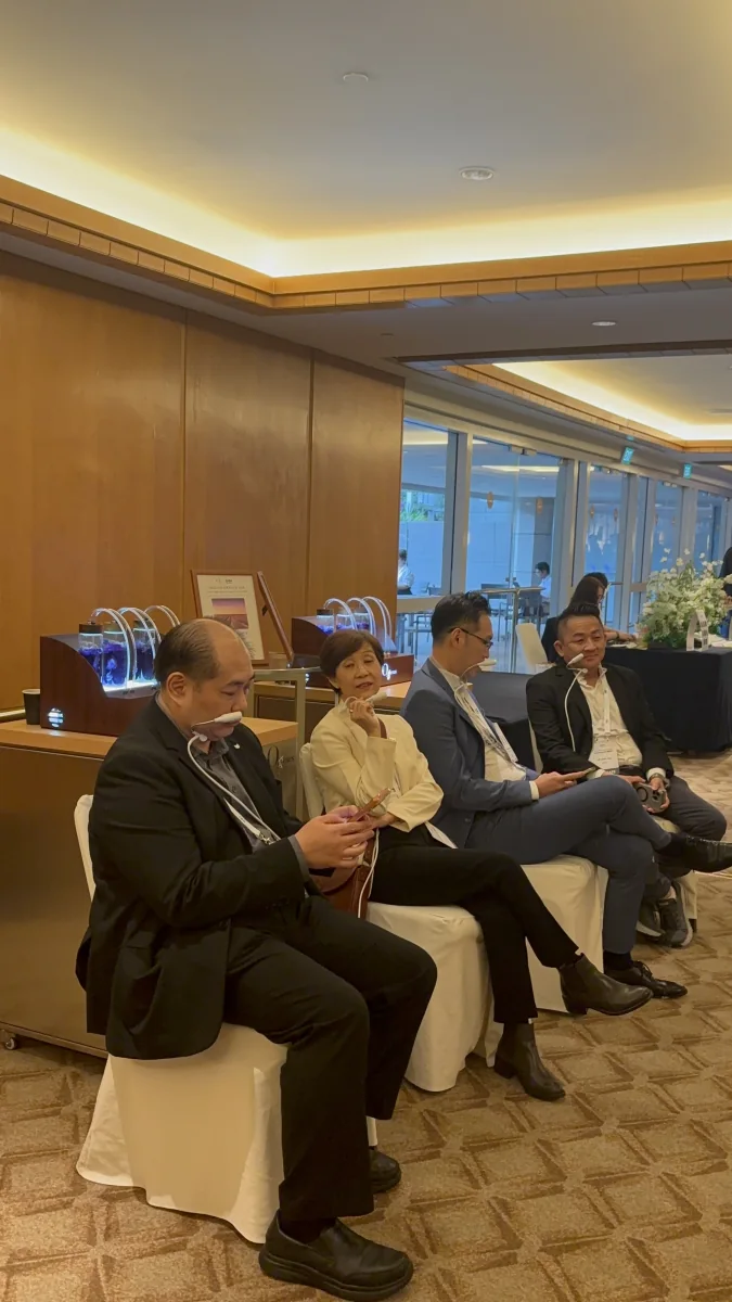 Guests using O2genes Oxygen Bar headsets at a corporate event