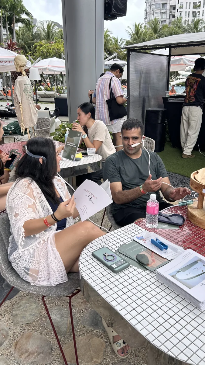 Guests using an O2genes Oxygen Bar at an outdoor event